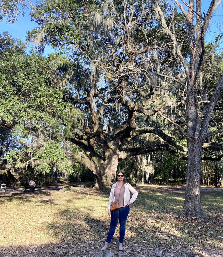Standing in front of a tree at Magnolia Plantation