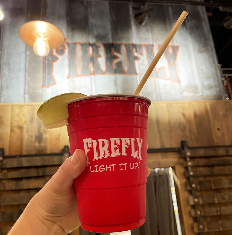 Drinking a cocktail at the firefly distillery in Charleston SC